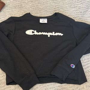 Black cropped champion sweatshirt. In perfect condition; worn twice.